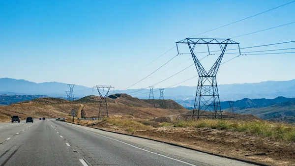 Transmission lines next to a highway in California.